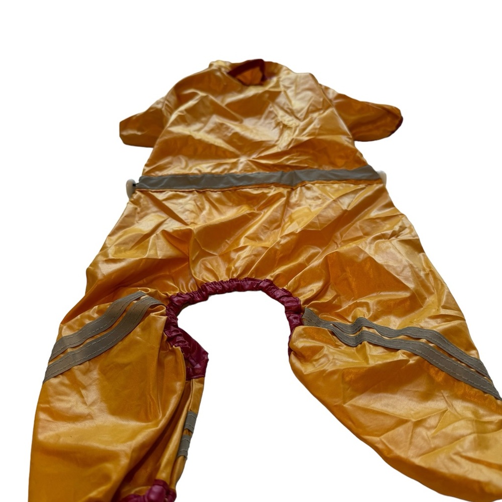 Rain suit for a small dog. Snap closure w/hood. Fits like a Small. EUC